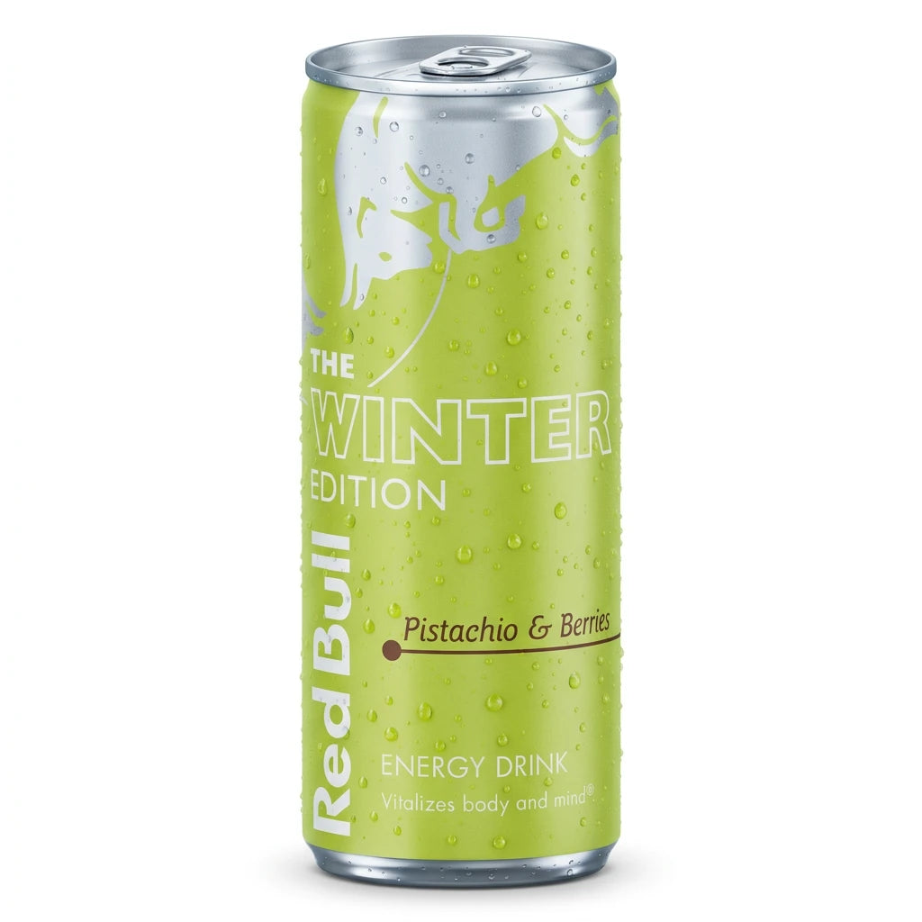 A single Red Bull Energy Drink can in the Winter Edition flavor, featuring a bright pistachio green color with condensation droplets, white text, and a silver top and bottom rim.